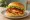 Shake Shack Korea — Gochujang Chicken Shack: an illustration of chicken, gochujang, kimchi, lettuce and more on burger bun.