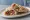 Shawarma b'Saj (شاورما بالصاج): an illustration of chicken, beef, lamb, garlic sauce and more.