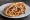 Shawarma Hodu (שווארמה הודו): an illustration of turkey, cumin, paprika, tahini and more on pita.