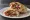 Shawarma Khalta (شاورما خلطة): an illustration of chicken, beef, lamb, garlic sauce and more on pita.