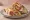 Shawarma ma' Batata (شاورما مع بطاطا): an illustration of chicken, beef, lamb, potato and more on pita.