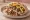 Shawarma with Chips (שווארמה עם צ'יפס): an illustration of turkey, lamb, chicken, potato and more on pita.