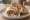 Shawarma Wrap (شاورما راب): an illustration of chicken, beef, lamb, garlic sauce and more on tortilla.