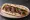 Shish Kebab Sandwich (ساندويش شيش كباب): an illustration of beef, lamb, onion, tomato and more on pita.