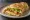 Shǒuzhuā Bǐng Quán Tào (手抓饼全套): an illustration of egg, ham, pork, lettuce and more.