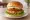 Shrimp Burger: an illustration of shrimp, egg, lettuce, tomato and more on burger bun.