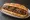 Şiş Köfte Ekmek: an illustration of lamb, beef, onion, parsley and more on bread.