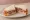 Smithfield Ham Sandwich: an illustration of ham and butter on white bread.