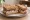 Smoked Mackerel Pâté Sandwich: an illustration of cream cheese, lemon and butter on white bread.
