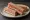 Smoked Salmon and Chive: an illustration of salmon, cream cheese, scallion and butter.