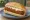 Snackbar Broodje: an illustration of mayonnaise and onion on kaiser roll.