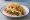 Soft Taco (USA): an illustration of beef, lettuce, tomato, cheddar cheese and more.