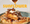 Syrup poured over stacked waffles with pecans and whipped butter, the yellow Sunflower wordmark across the top