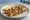 Souvlaki Kotopoulo (Σουβλάκι Κοτόπουλο): an illustration of chicken, olive oil, lemon, oregano and more.