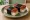 Spam Musubi (Korean-style): an illustration of rice, pork, maggi seasoning sauce and olive oil.