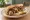 Spiedie: an illustration of chicken, pork, lamb, olive oil and more.