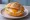 Spiegelei Brötchen: an illustration of egg, butter and pepper on kaiser roll.