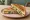 Spinach Corn Sandwich: an illustration of spinach, corn, cheese, butter and more on white bread.