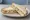Stilton Sandwich: an illustration of butter on white bread.