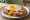 Strammer Max: an illustration of ham, egg, butter and pepper.