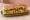 Subway Style Sandviç: an illustration of chicken, lettuce, tomato, onion and more on bread.