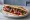 Sujuk Sandwich (ساندويش سجق): an illustration of beef, garlic, cumin and sumac on pita.