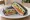 Sushi Sandwich (寿司サンド): an illustration of fish, cucumber, avocado and maggi seasoning sauce.