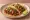 Taco de Adobada: an illustration of pork, vinegar, garlic, oregano and more on tortilla.