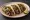 Taco de Arrachera: an illustration of garlic and salsa on tortilla.