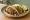 Taco de Asador: an illustration of beef, chorizo, onion, cilantro and more on tortilla.