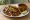 Taco de Birria de Res: an illustration of beef, onion, cilantro and lime on tortilla.