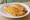 Taco de Canasta de Papa: an illustration of potato, onion and salsa on tortilla.