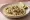 Taco de Escamoles: an illustration of butter and onion on tortilla.