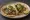 Taco de Lengua: an illustration of onion, cilantro, lime and salsa on tortilla.