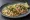 Taco de Sesos: an illustration of onion, cilantro, lime and salsa on tortilla.