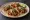 Taco de Trompo: an illustration of pork, pineapple, onion, cilantro and more on tortilla.