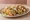 Taco Dorado: an illustration of chicken, beef, potato, sour cream and more on tortilla.