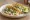Tacos de Requesón: an illustration of onion, salsa and lime on tortilla.