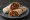 Tantuni Dürüm: an illustration of beef, tomato, onion, parsley and more on pita.