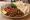 Tantuni Porsiyon: an illustration of beef, tomato, onion, parsley and more on pita.