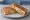 Tavuklu Tost: an illustration of chicken, cheese and butter.