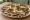Tlayuda de Cecina: an illustration of pork, beans, cabbage and avocado on tortilla.