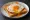 Toast mit Spiegelei: an illustration of egg, butter and pepper on bread.