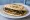 Torta al Testo con Salsiccia: an illustration of sausage and olive oil.