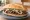 Torta de Tasajo: an illustration of beans, avocado and onion on bread.