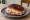 Tortita Negra con Jamón y Queso: an illustration of ham and cheese.