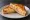 Tost Hawajski: an illustration of ham, pineapple and cheese.