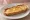 Tostada con Mantequilla: an illustration of butter on baguette.