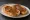Tostadas con Dulce de Leche: an illustration of butter on baguette.