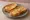 Tostadas con Manteca: an illustration of butter on baguette.
